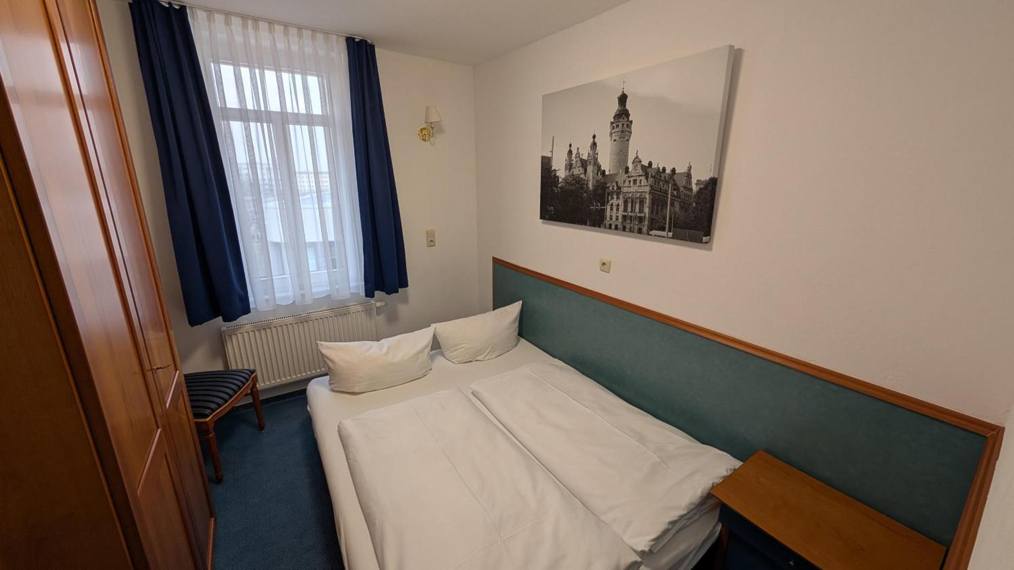 Hotel Am Bayrischen Platz Лайпциг Стая снимка