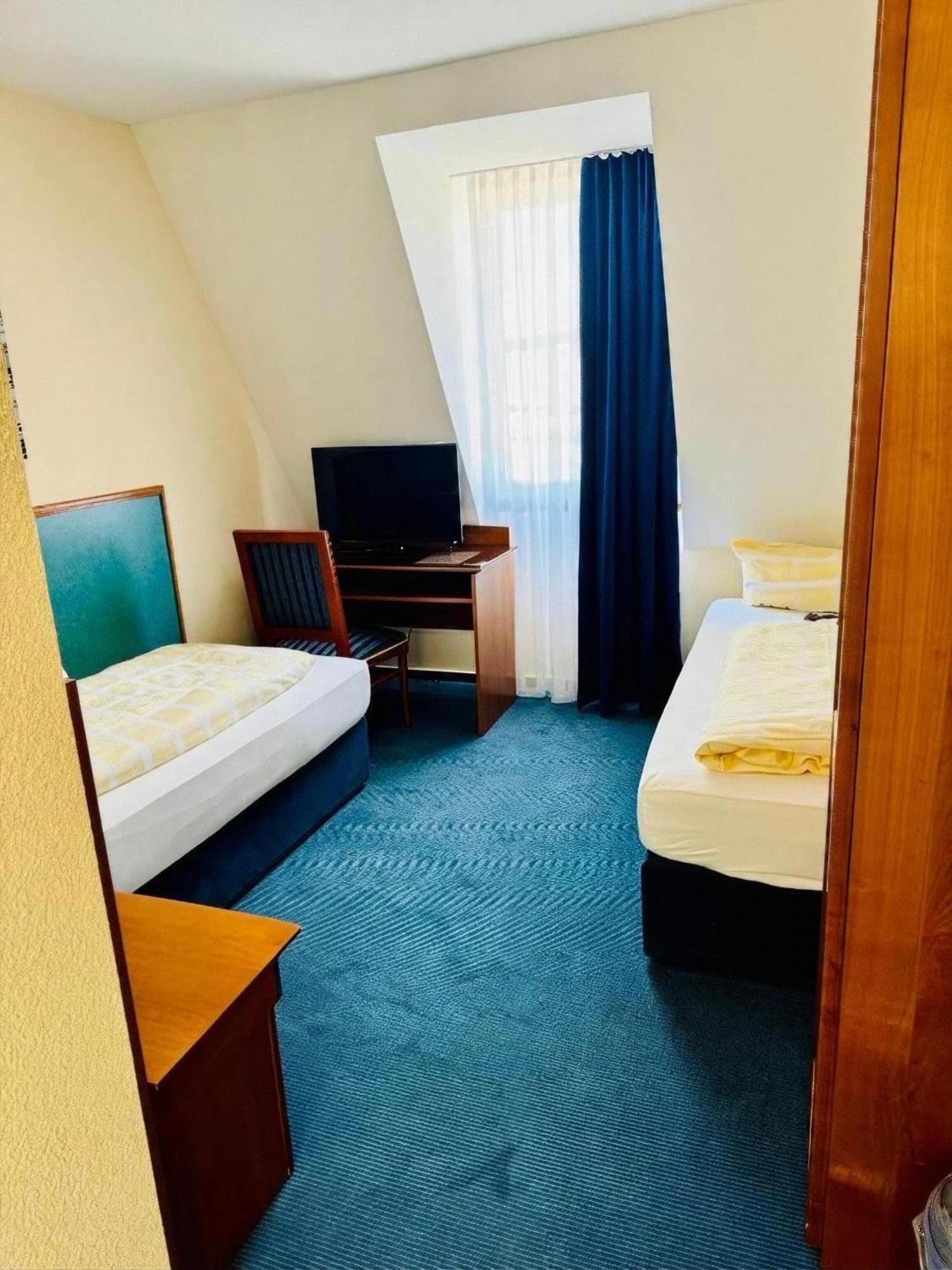 Hotel Am Bayrischen Platz Лайпциг Стая снимка